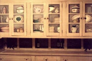 Trompe L'oeil dishes in a cabinet