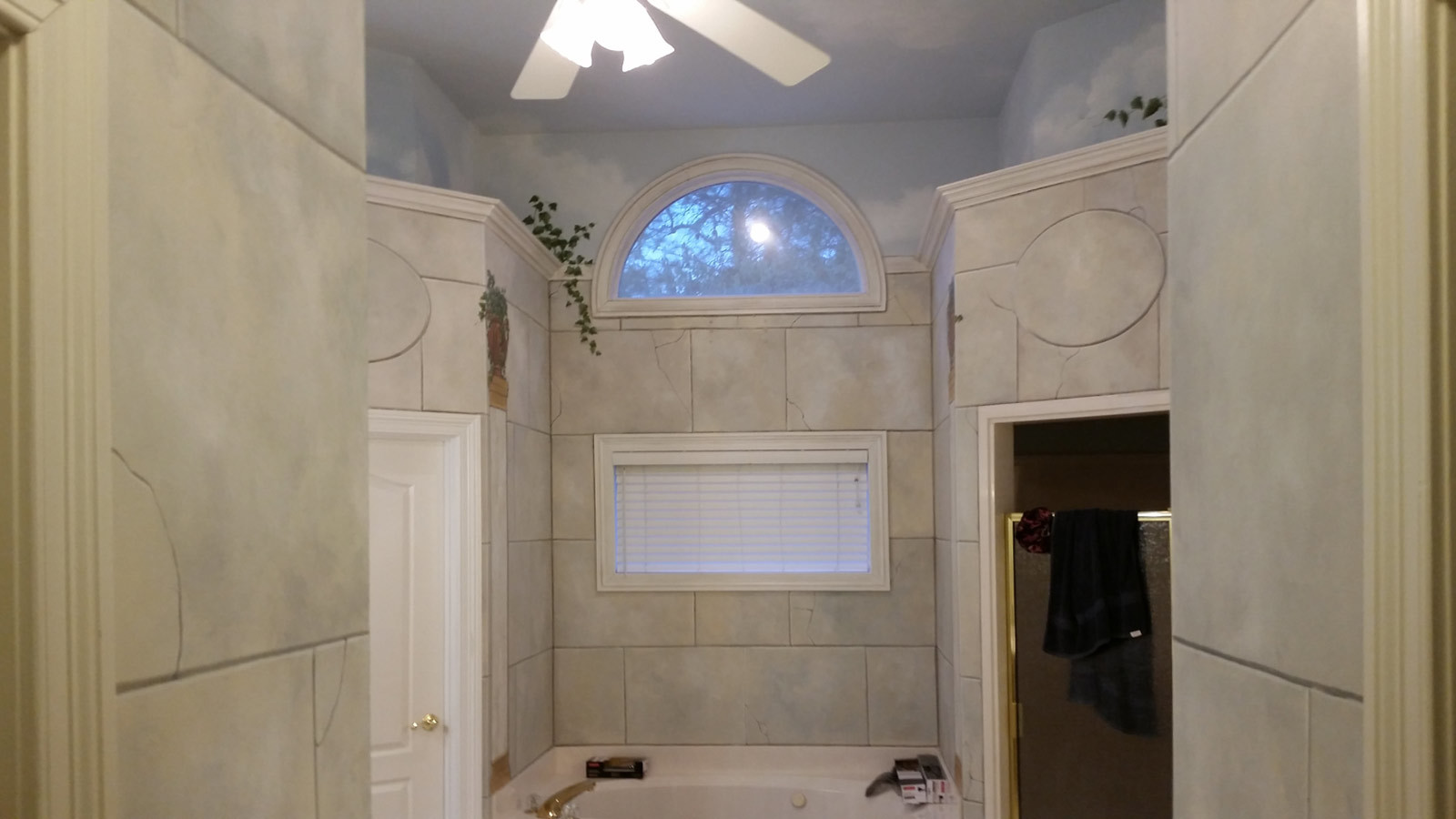 Faux stone, columns, and niche