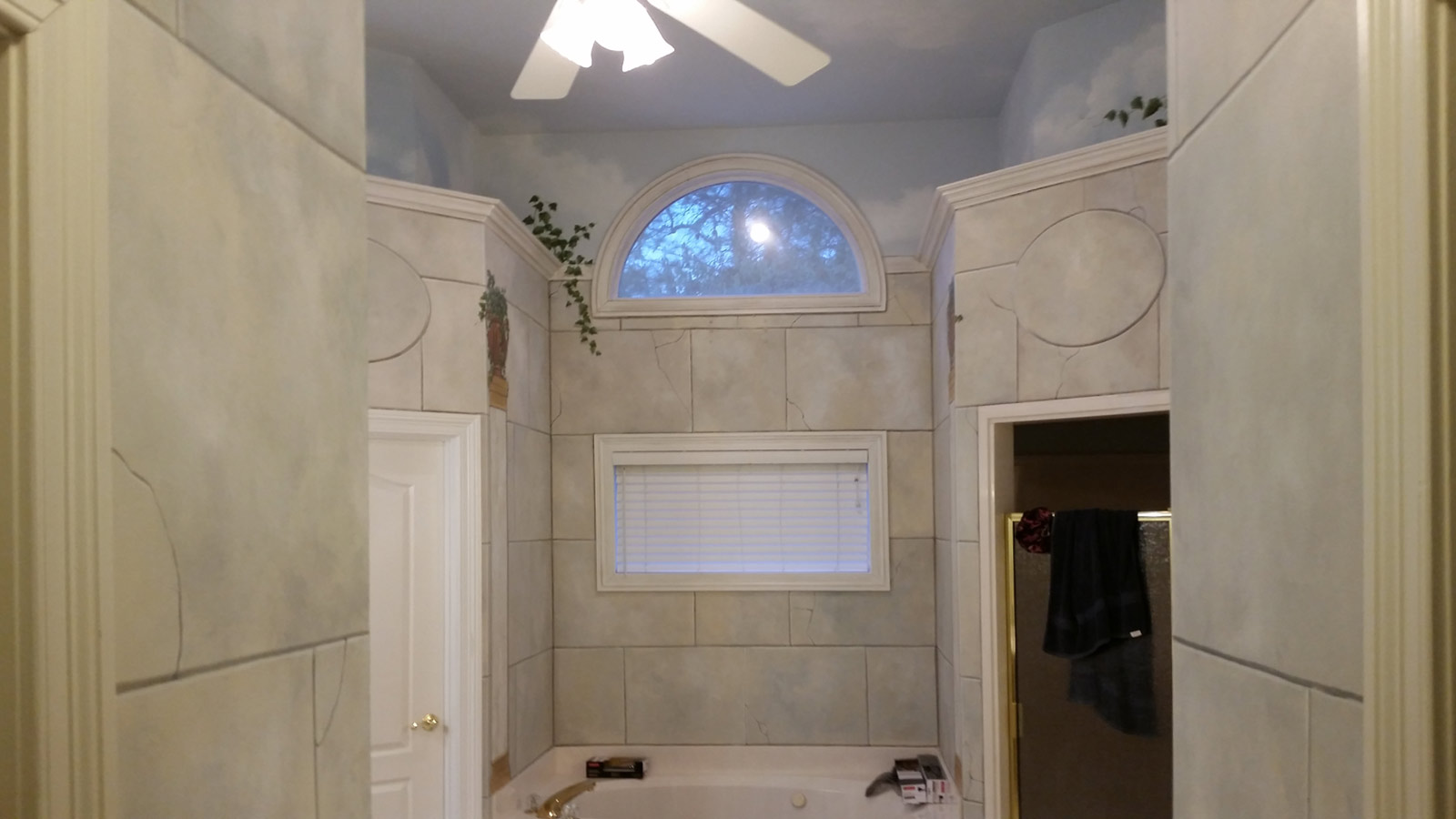 Faux stone, columns, and niche